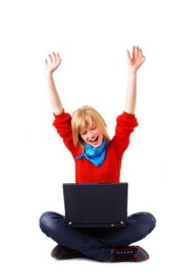 A lineup of 5 young people sitting with laptops. Isolated on white background.