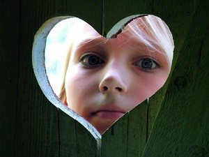 Peeking Through a Heart-Shaped hole - public domain from pixabay_com